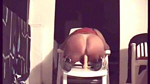 mature woman pleasures herself on the terrace