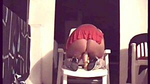 mature woman pleasures herself on the terrace