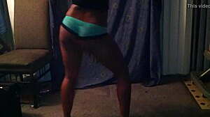 This skinny chick dances energetically in the spotlight.