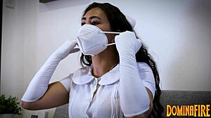 Nurse explores gloves fetish in hospital setting.