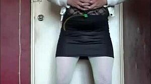 Bisexual sissy crossdresser teases with homemade swallow action