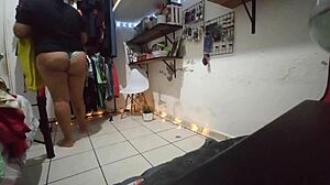 Mexican brunette with big ass folds clothes in thong, caught on hidden camera
