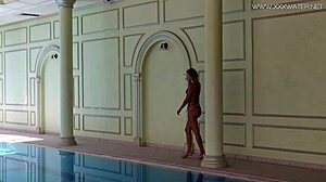 Sexy Russian milf Kalisy masturbates by the pool