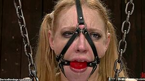 big tits milf bound in bdsm, choked and fisted roughly