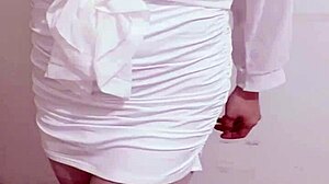 office worker in female outfit masturbates in corridor