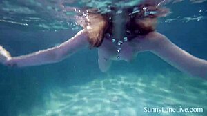 Extra Wet Blonde Sunny Lane Delivers a Slick Public Pool Blowjob with Skill