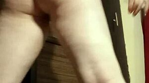 busty camgirl in grey teases with ass play