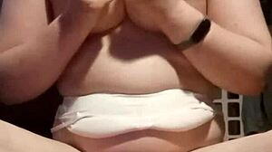 petite amateur with big natural tits plays with breasts