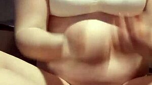 petite amateur with big natural tits plays with breasts