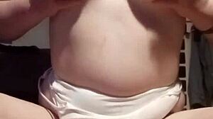 petite amateur with big natural tits plays with breasts