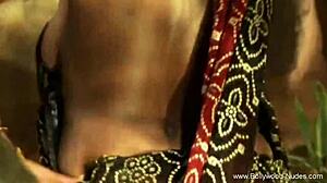 Sensual oriental babe performs erotic body movements in experience.