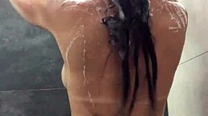 young japanese girl teases in shower with her shaved body