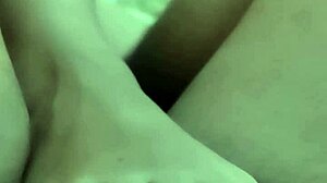 Beautiful feet giving a sensual footjob to a hard cock