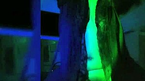 Watch this naughty latina rip her clothes in the dark room!