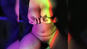 Watch this naughty latina rip her clothes in the dark room!