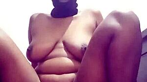 in the bedroom, this bbw african babe uses a dildo to fuck her big ass until she squirts