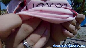 Busty babe toys her pussy before spoon fucking.