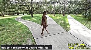 Petite teen struts in high heels at park