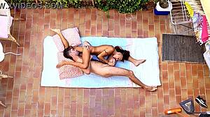 birdview of amateurs couple exposed on the balcony