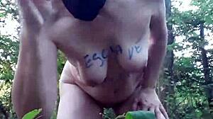 Female Slave Masturbates in Forest