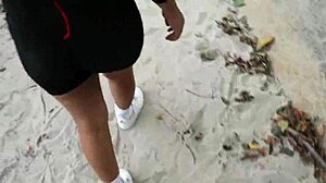 Amateur couple enjoys outdoor oral and banging by the river, ignoring onlookers.