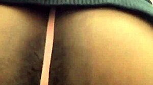 Exotic babe strips out of sweats in public bathroom