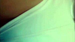 tattooed redhead shows off tan lines and big ass close-up