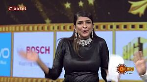 Lakshmi Manchu flaunts huge boobs with nipple pokies.