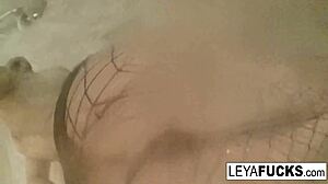 Leya Falcon takes a camera into the shower to film her nude body