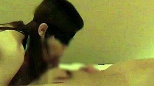 home made video of beautiful woman in chinese dress giving handjob and blowjob to friend until ejaculation