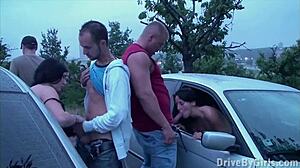 Watch This Girl Dive Into Wild Public Gang Bang Orgy Through Car Windows With Strangers!