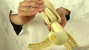 Whoa, crushing bananas with hands for fetish fun! 🍌