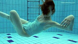 anna netrebko’s small tits shine in striped swimsuit