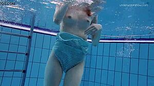 anna netrebko’s small tits shine in striped swimsuit