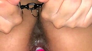 Gaping her ass with toys.