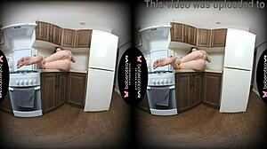 Solo girl Sara Bork has fun in the kitchen and pleases herself while her big tits are being touched in VR.