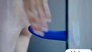 Wow, Two Attractive Babes Fucking Blue Dildo While Licking Each Other!