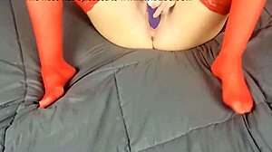 watch her in those red stockings, so erotic and european.