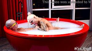 Tattooed babe swallows monster cock cum