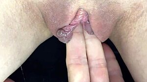 Close up of a wet and hairy pussy in action