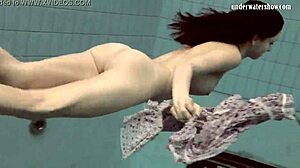 Loris Licicia shows off her petite figure in a hot underwater naked swim