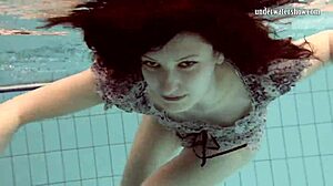 Loris Licicia shows off her petite figure in a hot underwater naked swim