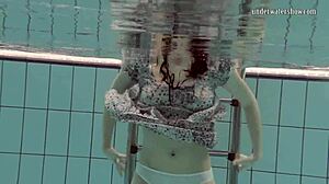 Loris Licicia shows off her petite figure in a hot underwater naked swim