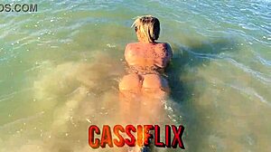 Exhibiting on beach for guy