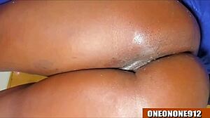 Fresh ebony pussy drips during masturbation in ripped clothes.