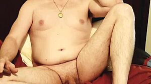 Pressing girthy cigar between lips and smoking