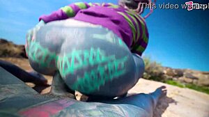 Does this tattooed girl with pierced pussy get anal outdoors?