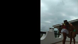 Me and lunna vaz on balcony during party