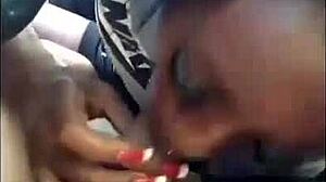 The ebony chick feels intense pleasure sucking the white dick, getting sloppy and wet.