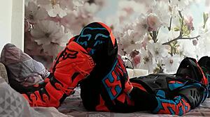 Motocross Rider In Costume Treads Boots In Gay Scene